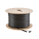 Coiled black cable on wooden spool. Flat drop with connector